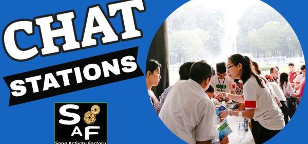 Students participating in ESL song challenge and chat stations activity